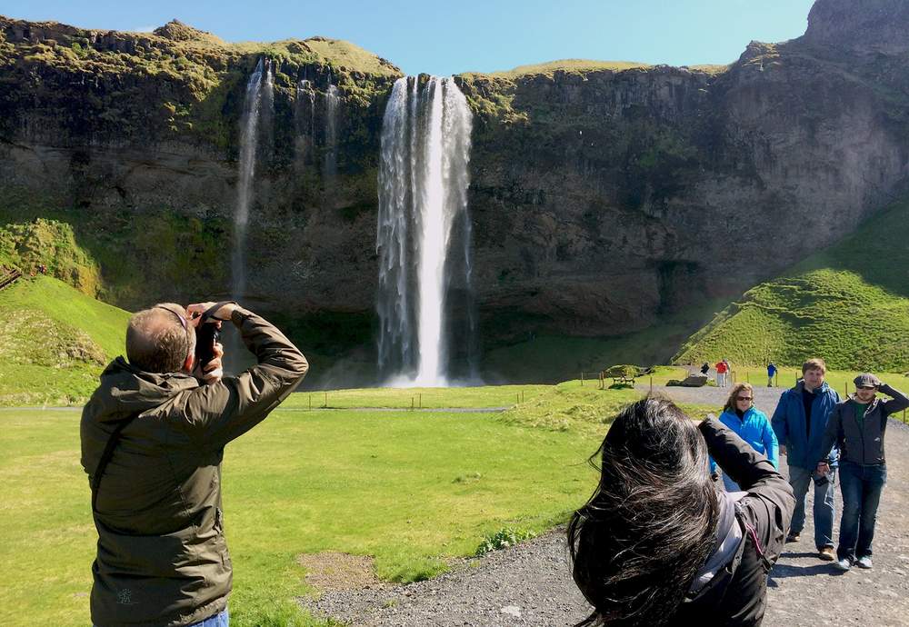 Tourists at the Seljalandsfoss waterfall.&amp;nbsp;
