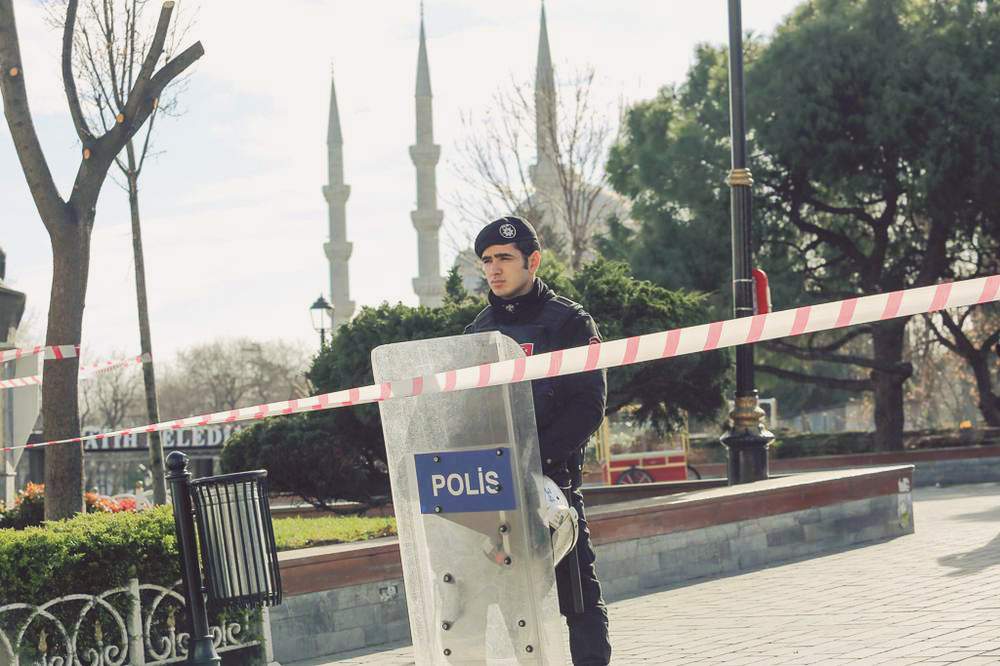 A police officer secures the area after a January explosion near the Ottoman-era Sultanahmet mosque. This attack was followed by others, as well as a possible coup attempt in July. Photo: Kamal Aslan/Reuters