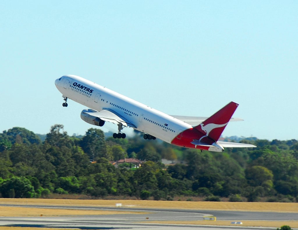 A Qantas flight takes off from Perth International Airport.