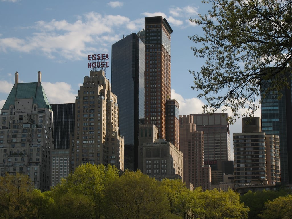 A photographer in Central Park takes a picture of Essex House, which Strategic Hotels acquired in September. 