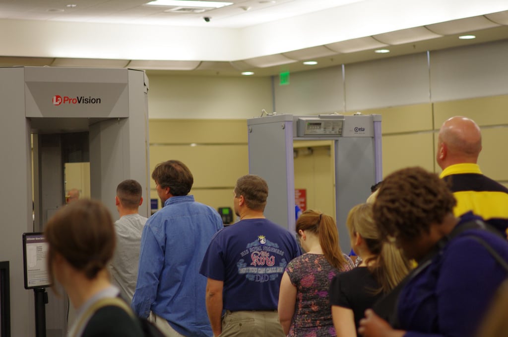 Passengers wait to pass through security scanners in Fresno, California. [NOTE: ProVision is not the scanner company mentioned in the article.] 