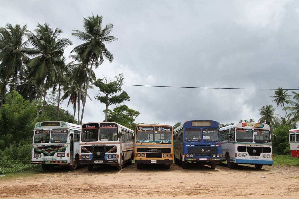 Buses line up near the beach in southwest Sri Lanka.