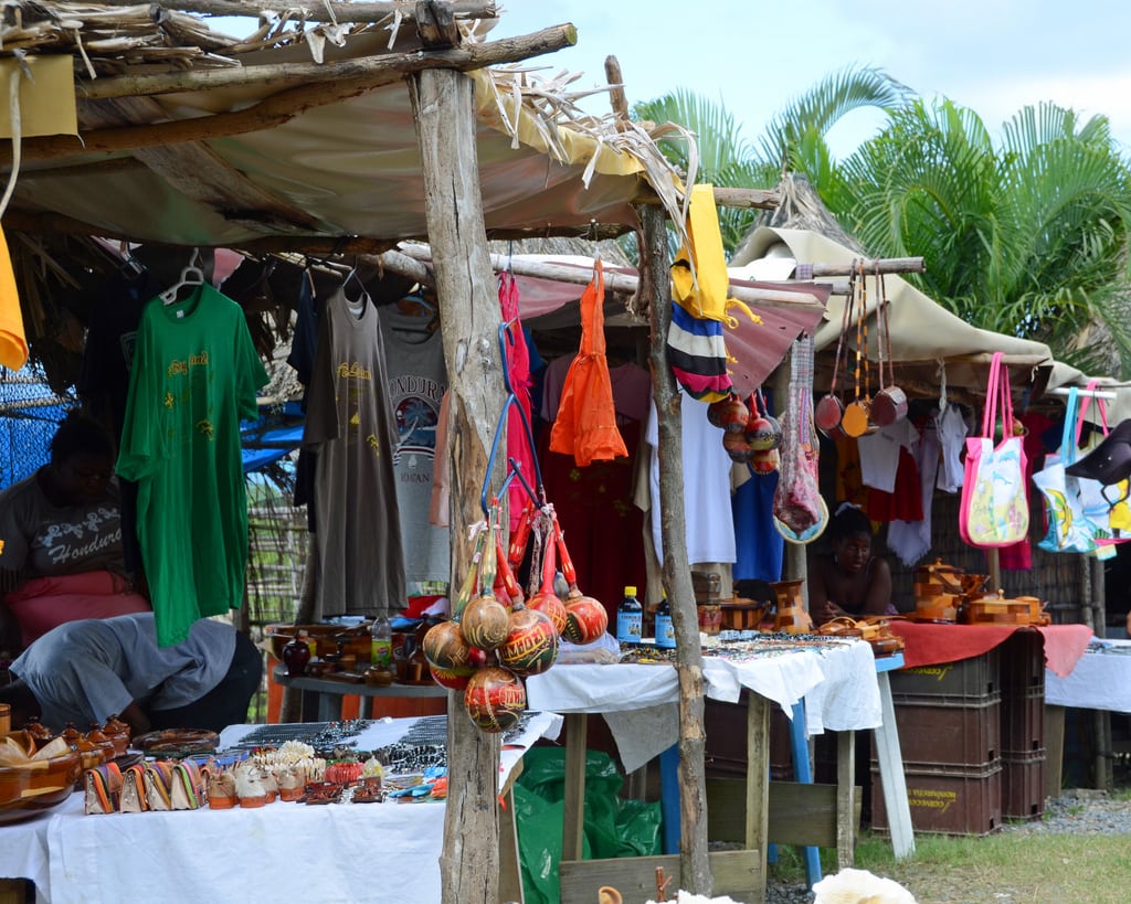 Roadside vendors sell trinkets to tourists in Roatan, Honduras. 