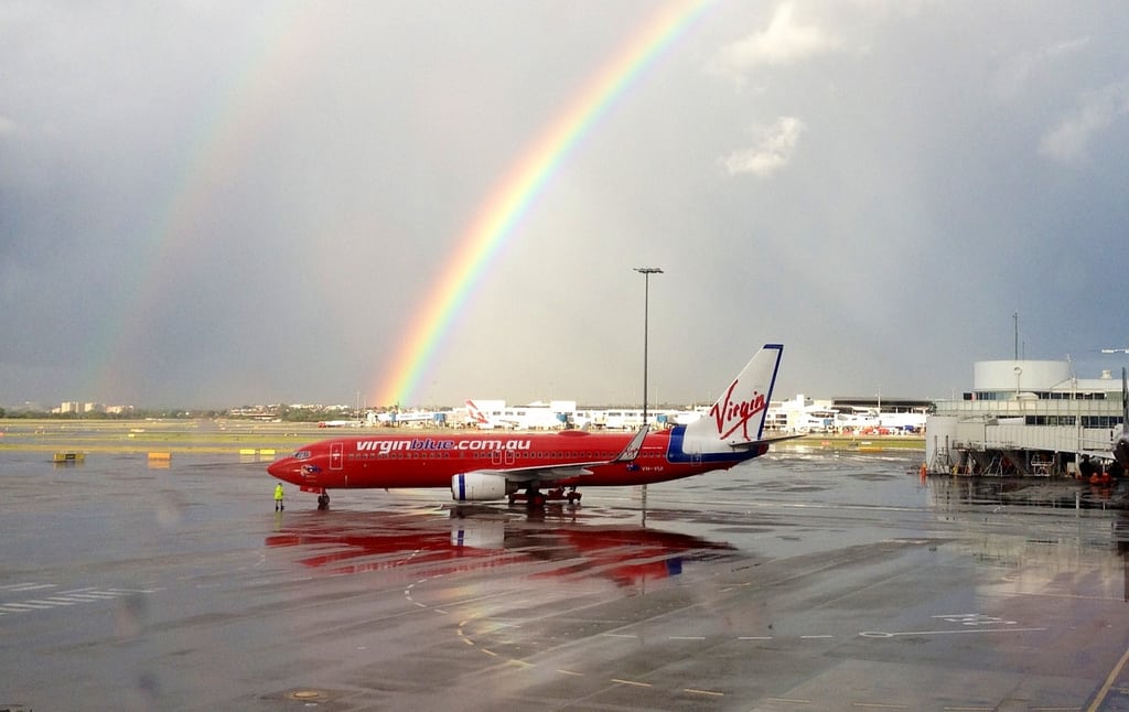 A Virgin Australia flight waits out the rain in Brisbane. 