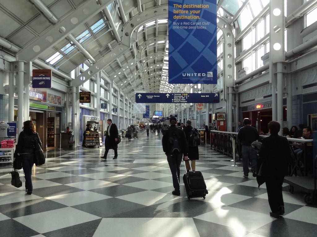 Passengers walk through O'Hare International Airport in Chicago.