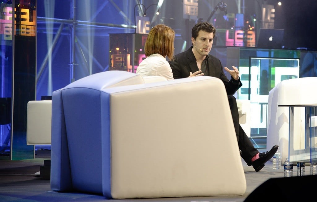 Airbnb CEO Brian Chesky on stage at LeWEB11 in Paris, France