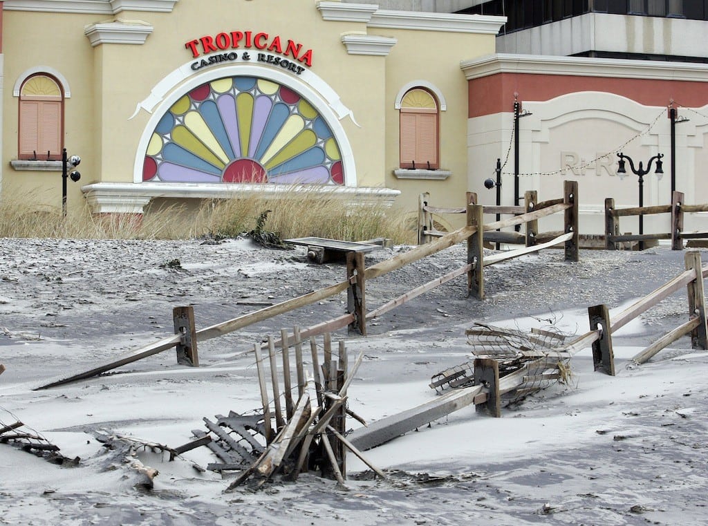 A pathway to the beach from the boardwalk is buried in sand up to the railings, at a beach in the aftermath of Hurricane Sandy in Atlantic City, New Jersey, October 30, 2012. 
