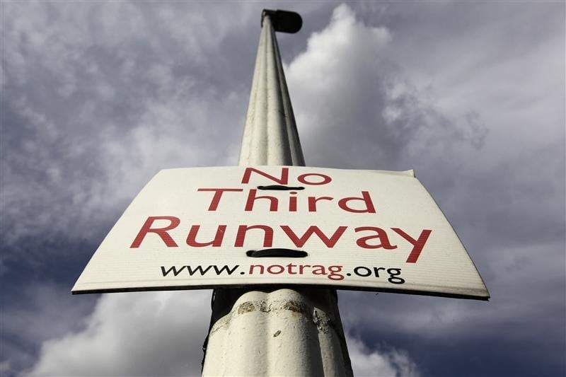 A sign protesting against a third runway is seen in the village of Sipson near Heathrow Airport in west London August 28, 2012. 