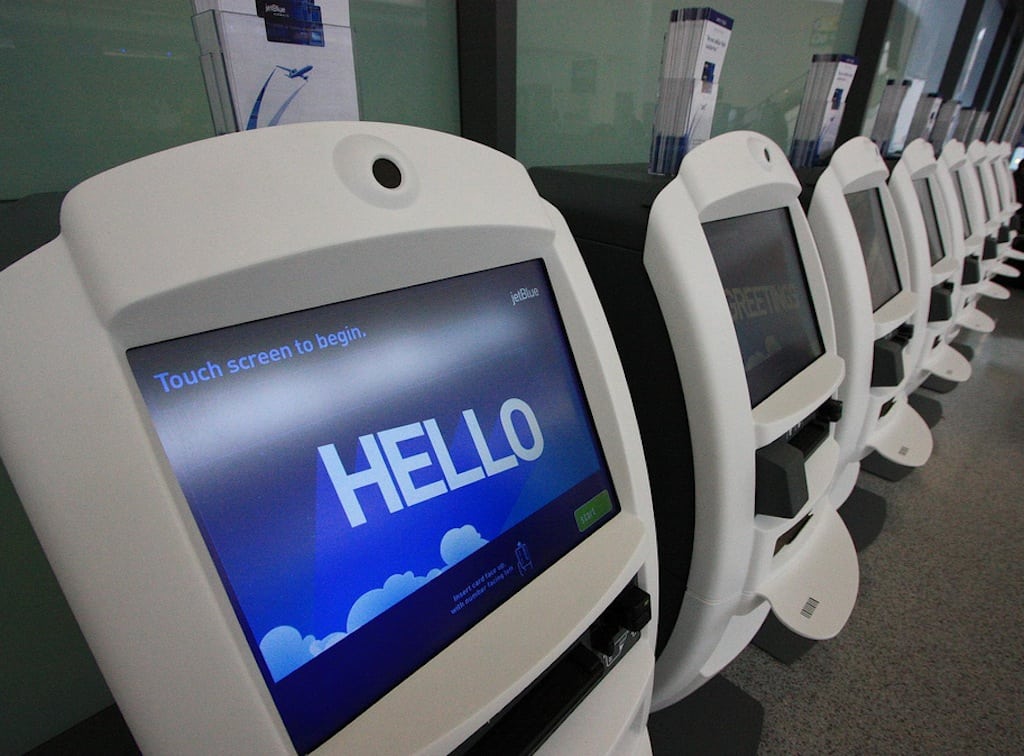 JetBlue gives a big "hello" to passengers in Terminal 5 at JFK, but thinks politicians aren't greeting 2013 in a responsible way. 
