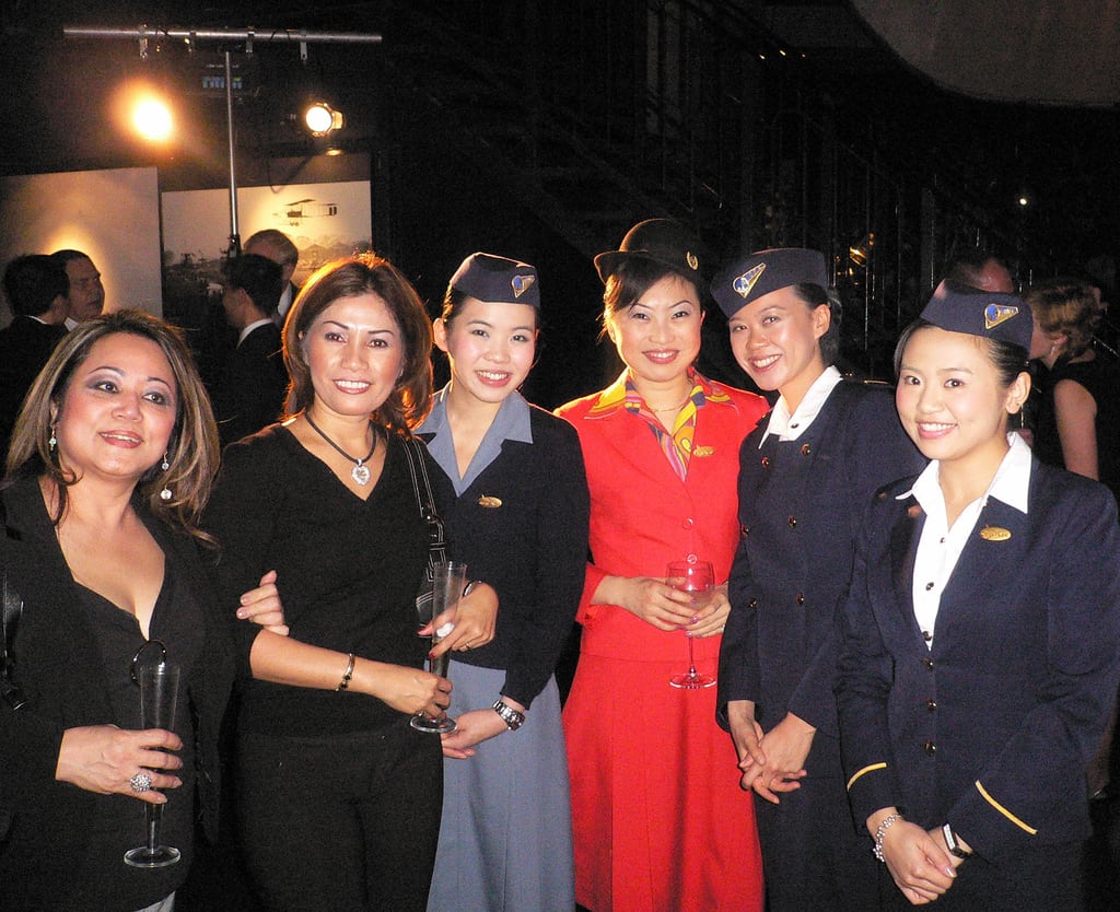 Cathay Pacific flight attendants attend the airline's 60th Anniversary party at the Science Museum.