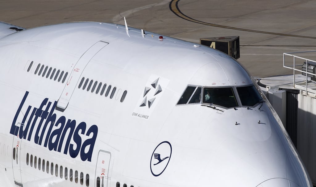 A Lufthansa 747-400 at the gate. 