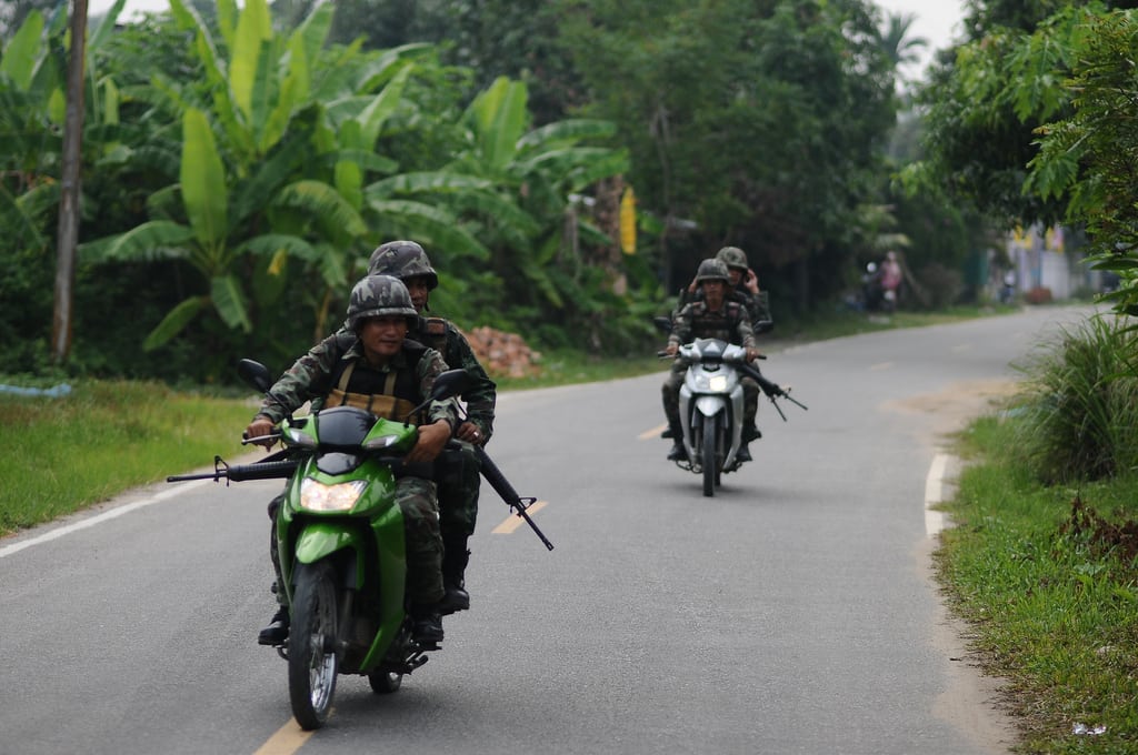 Thai soldiers on motorcycles in Pattani state.