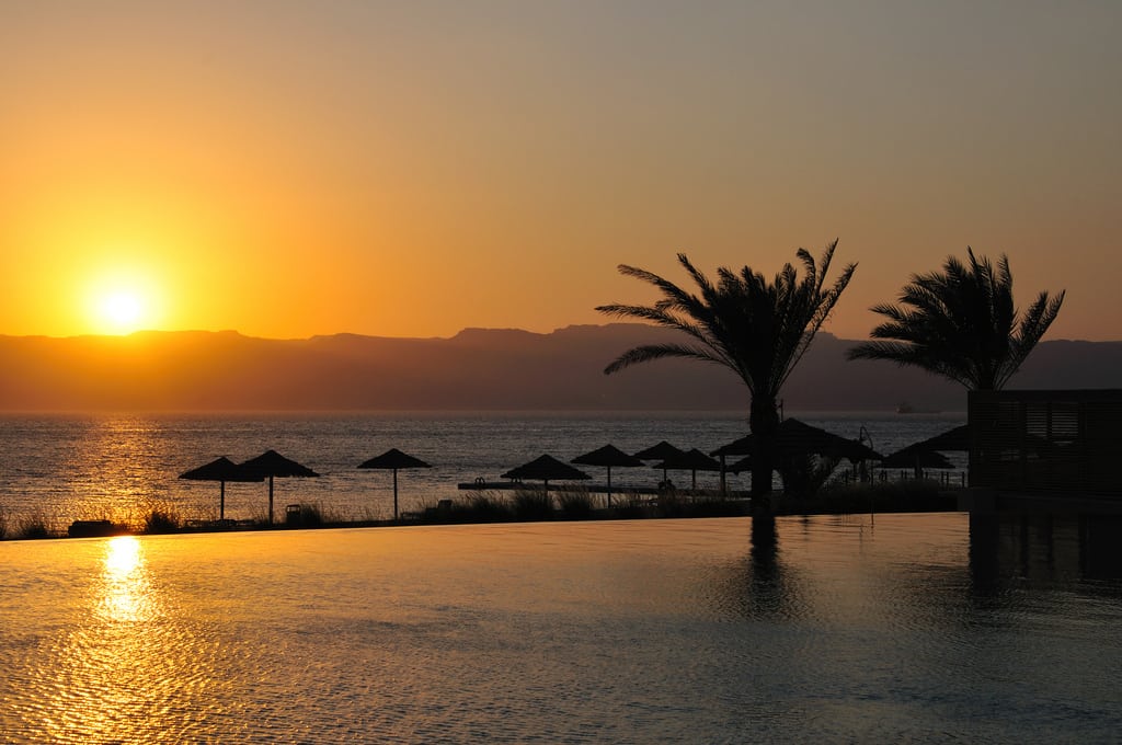 A sunset seen from swimming pool at Radisson Blu in Jordan,10 km from Saudi Arabia border. 