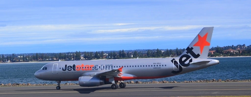 A Jetstar Airways plane sits on the runway at Sydney Airport. 