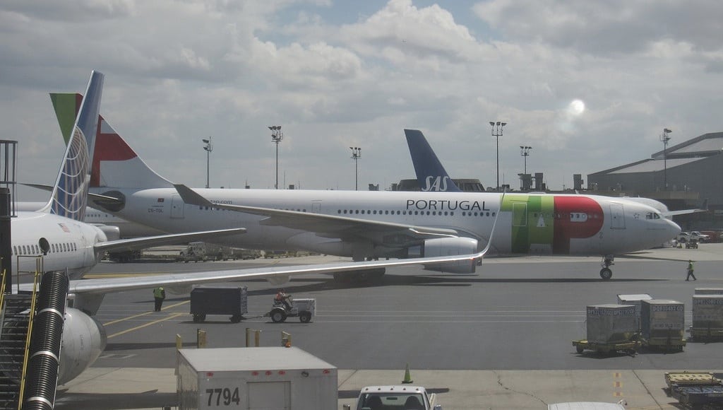 TAP Air Portugal, with its distinctive livery, arrives into Newark from Lisbon.