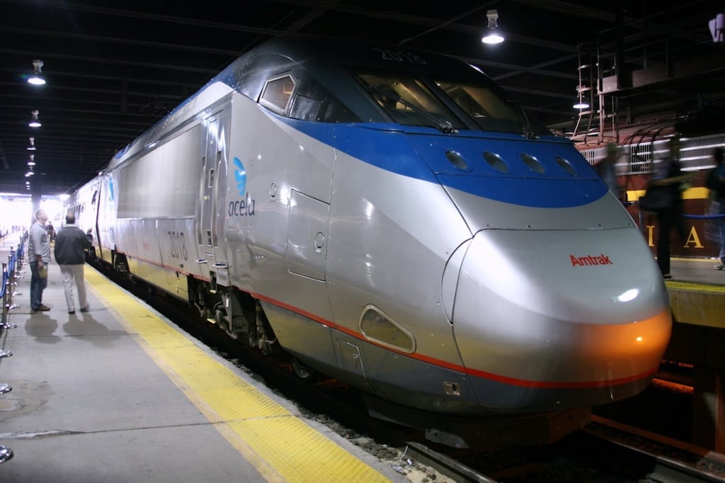The Acela Express #2018 consists of two power cars, a cafe car, a first class car, and four business class cars, semi-permanently coupled together. 