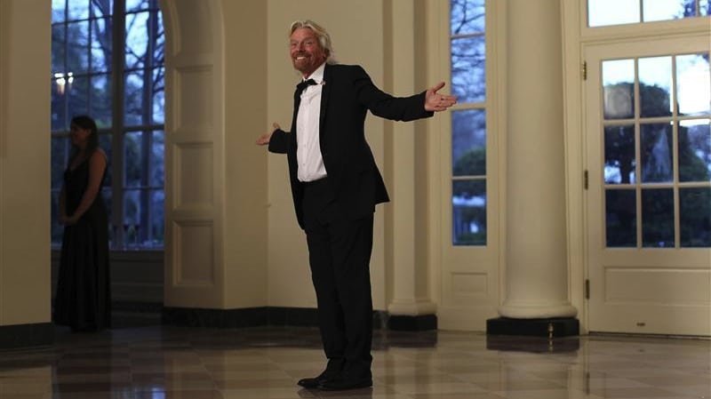 British billionaire Richard Branson arrives for a State Dinner held in honor of Britain's Prime Minister David Cameron and his wife Samantha at the White House in Washington March 14, 2012.