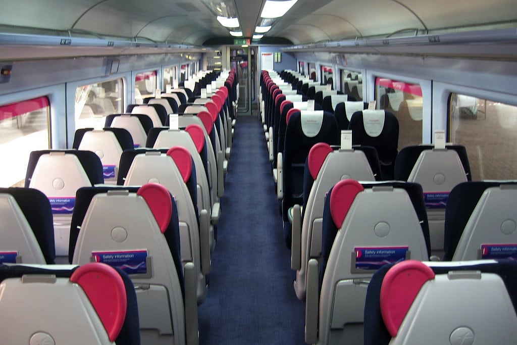 Interior of a first-class car on a Great Western train. 