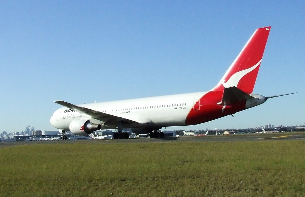 Qantas 767 touches down at Sydney Airport. 