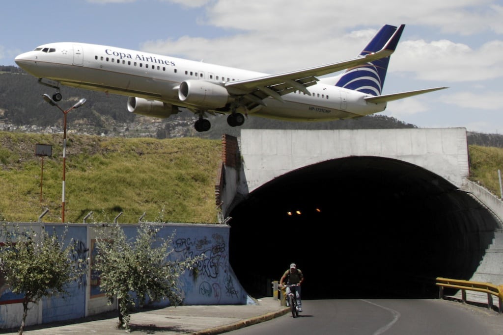 In this Jan. 8 2013 photo, a plane approaches the runway at the Mariscal Sucre airport in Quito, Ecuador. 