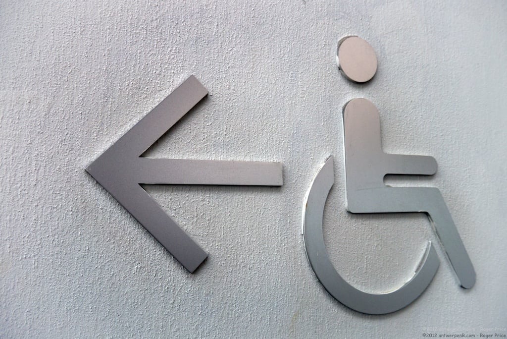 A sign points to wheelchairs in Hong Kong. 