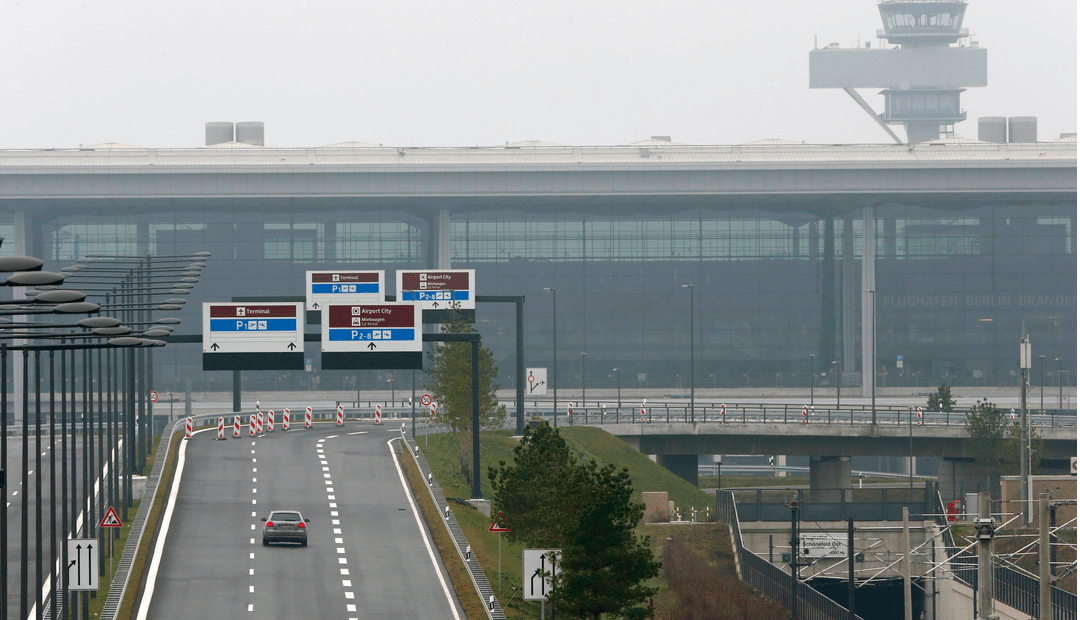A car drives to the construction site of the future Berlin Brandenburg international airport Willy Brandt (BER) in Schoenefeld, January 7, 2013. 