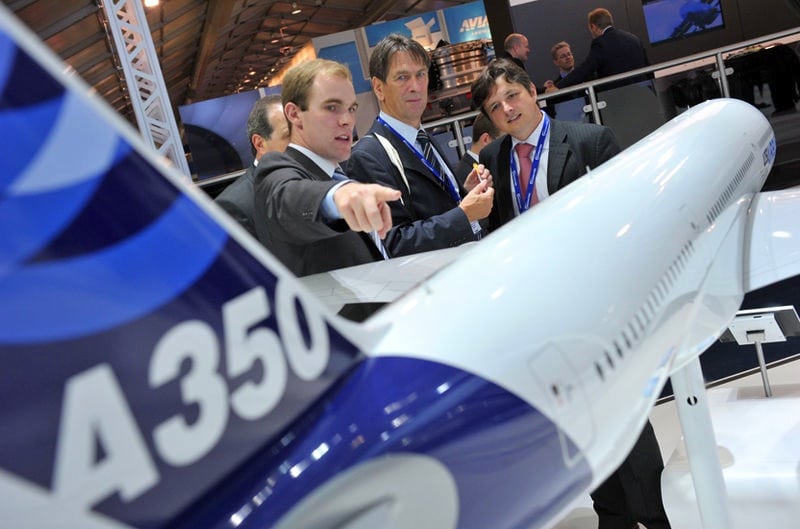 An Airbus A350 model at an aviation show. 
