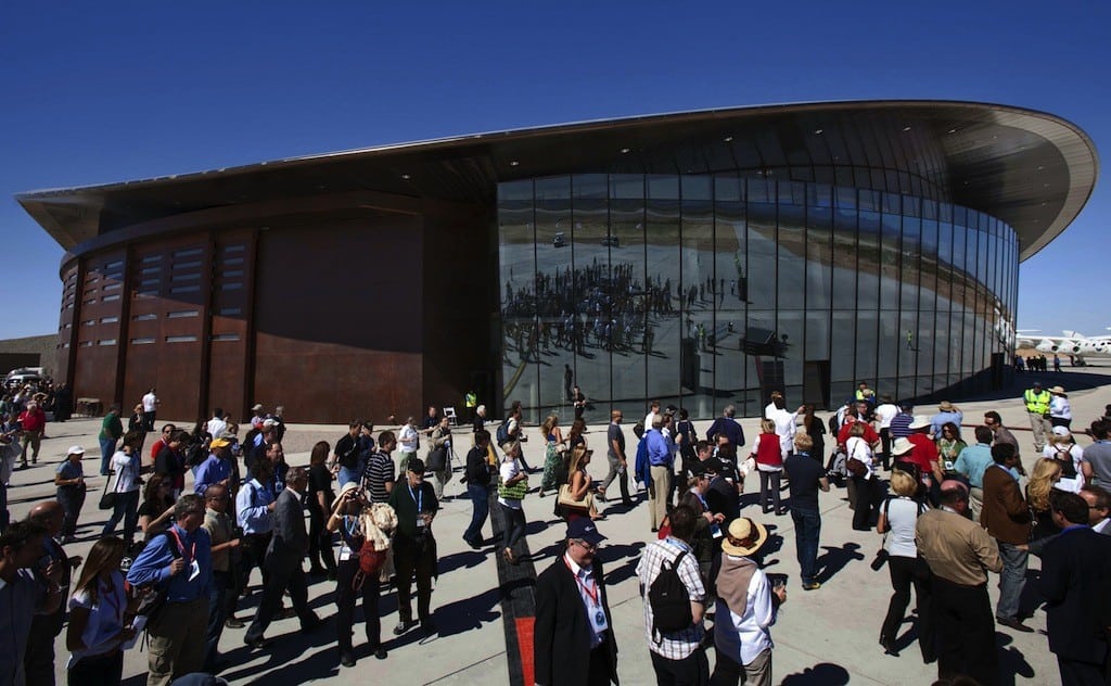 In this Oct. 17, 2011 file photo, guests stand outside the new Spaceport America hangar in Upham, N.M. 