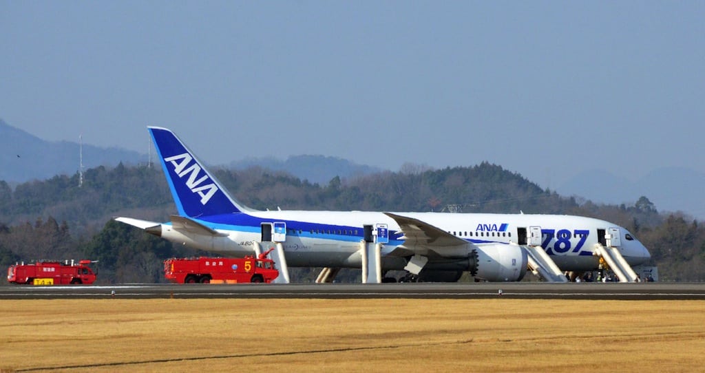 An All Nippon Airways flight sits at Takamatsu airport in Takamatsu, western Japan after it made an emergency landing Wednesday, Jan. 16, 2013. 