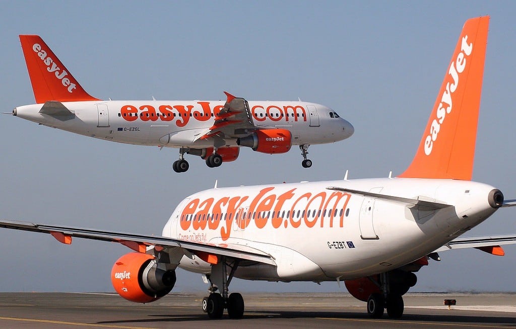 Two easyJet planes at Faro airport in the Algarve, Portugal. 