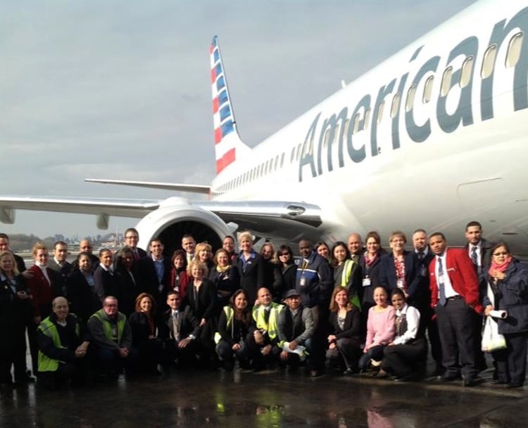 American Airlines and American Eagle employees at LaGuardia taking first look at new livery on a 737-800. 