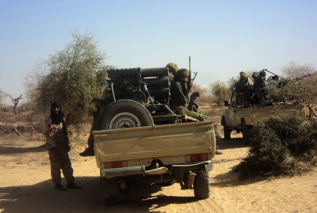 Touareg militants, seen driving near Timbuktu, share control of northern Mali. 