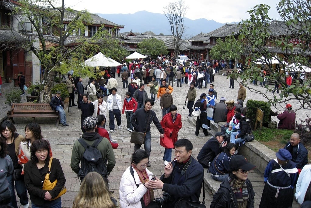 Chinese tourists go on holiday in Lijiang, China. 