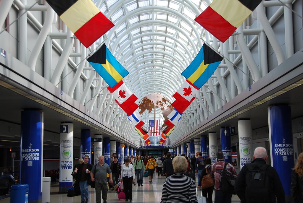 Passengers walk through Terminal 3 at Chicago O'Hare International Airport. 