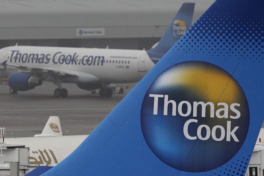 Thomas Cook aircraft are seen parked on the tarmac at Manchester airport in Manchester, northern England, November 22, 2011. 