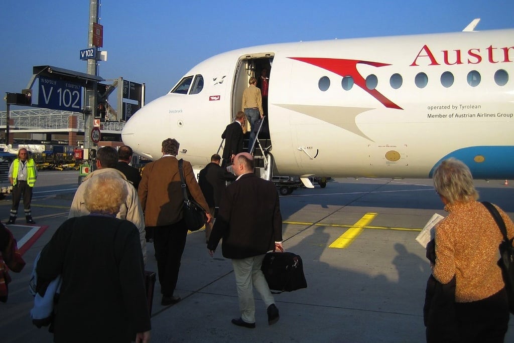 Passengers board Austrian Airways at Frankfurt Airport for a flight to Salzburg. 