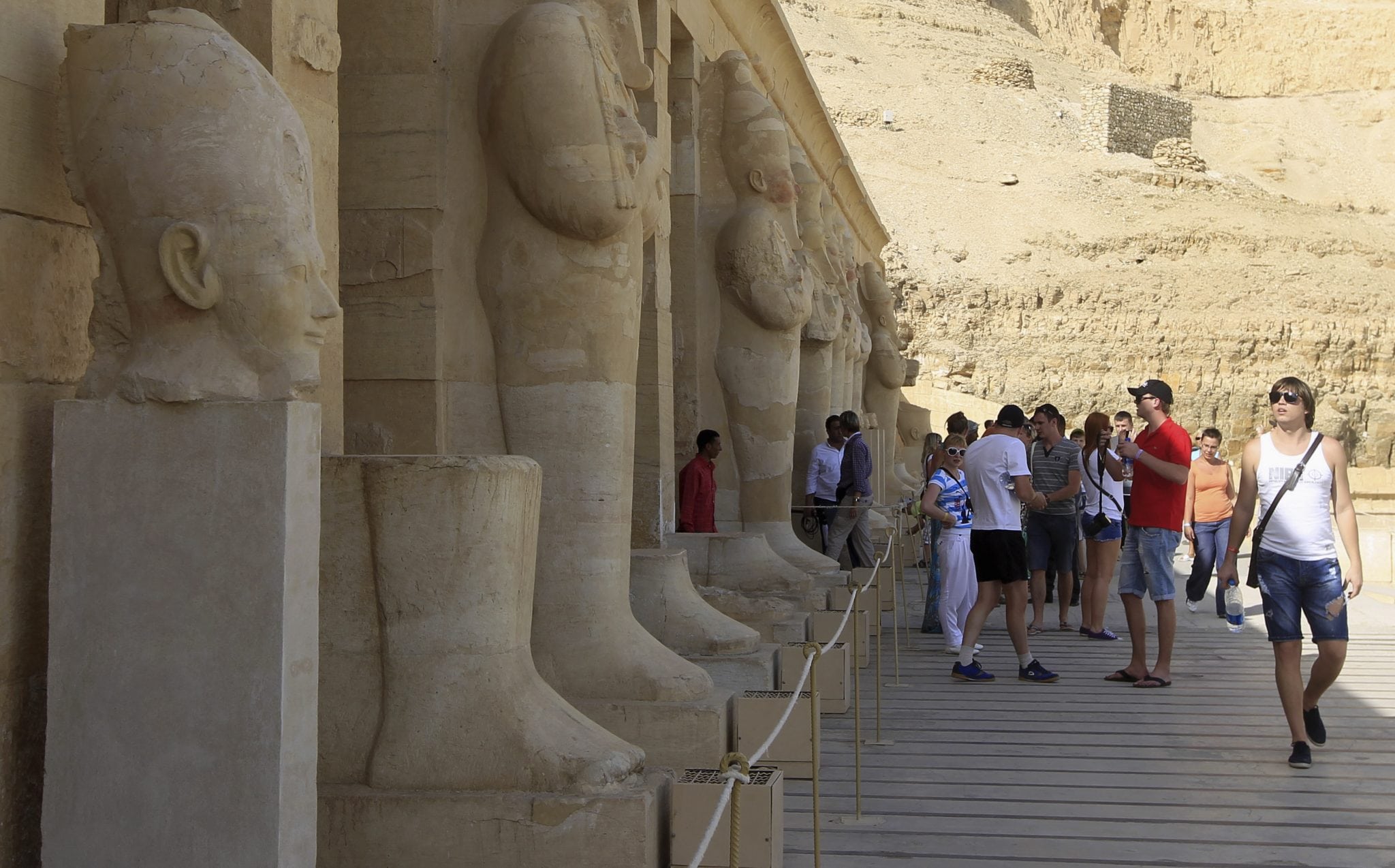 Tourists are seen at the Temple of Hatshepsut, a day after a hot air balloon crash left 19 foreigners dead, in Luxor.