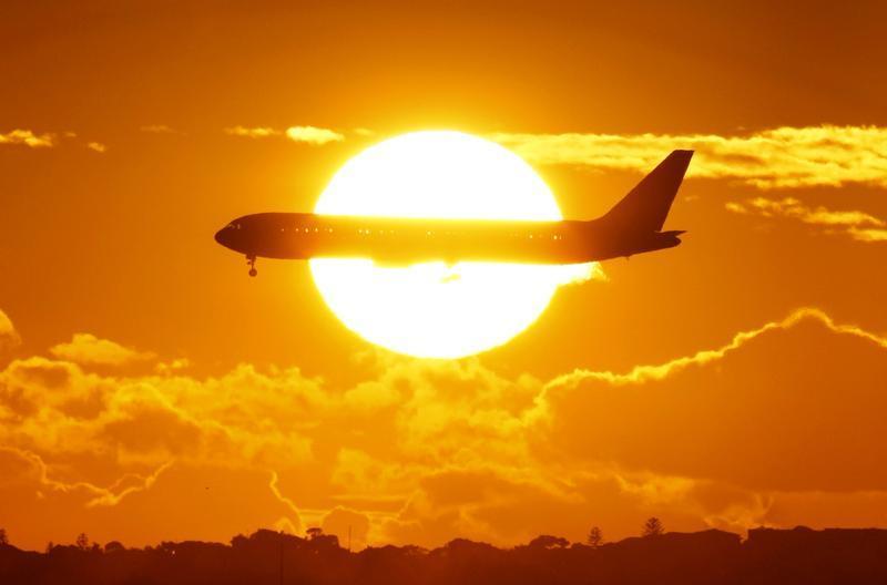 An international passenger plane approaches Sydney airport. 