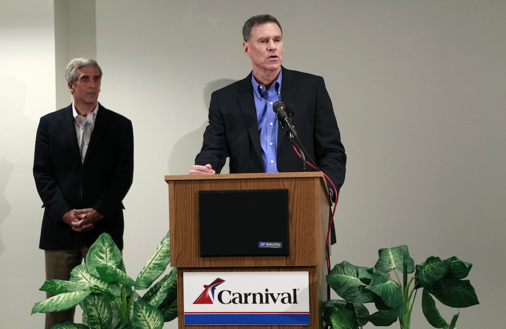 Carnival Cruise Lines President and Chief Executive Officer Gerry Cahill (R) speaks as Senior Vice President Terry L. Thornton looks on at Carnival's headquarters at a news conference concerning the Carnival ship Triumph in Miami, Florida February 12, 2013. 