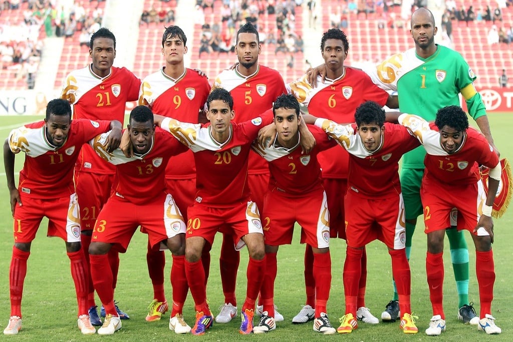 The Omani national football team pose ahead of their 2014 FIFA World Cup qualifying match against Iraq in Doha.