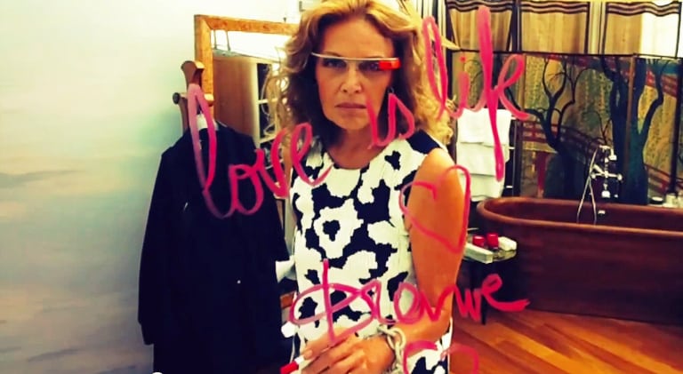 Diane von Furstenberg wearing the Google Glass backstage at the Fashion Week last year. Screenshot from YouTube video.