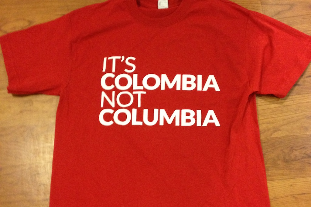 Brightly colored t-shirts reading "It's Colombia, not Columbia," are the core of the campaign. 