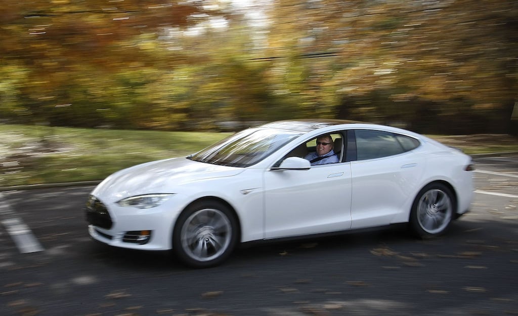 Peter Spirgel, an attorney with Flaster/Greenberg, drives his new electric car, a Tesla Model S performance model near the law firm in Cherry Hill, New Jersey, November 12, 2012. 