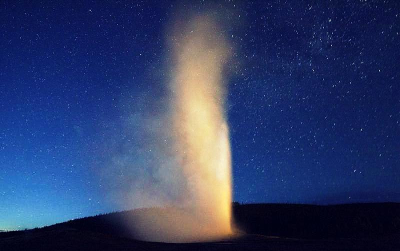 A night exposure of Old Faithful Geyser, the first geyser in the park to be named, erupting in Yellowstone National Park, Wyoming, June 23, 2011. 