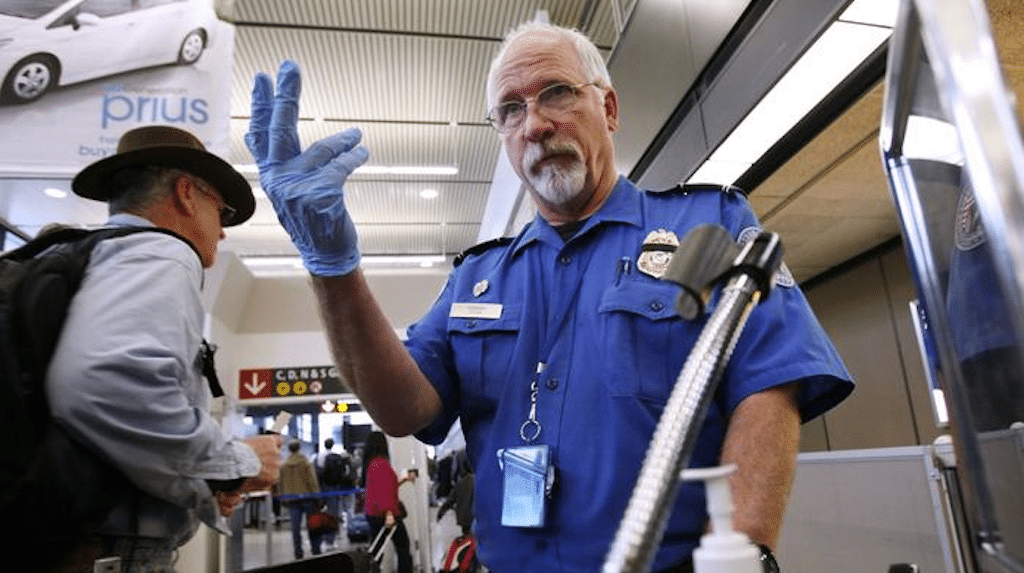 A TSA officer at Seattle-Tacoma Airport. The TSA claims officers would be able to focus on more important security threats if small knives are allowed to pass through security. 