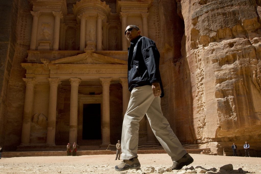 President Obama's tourism legacy is mostly positive but key challenges remain. Pictured is Obama touring the Treasury in the ancient city of Petra, Jordan in 2013. 