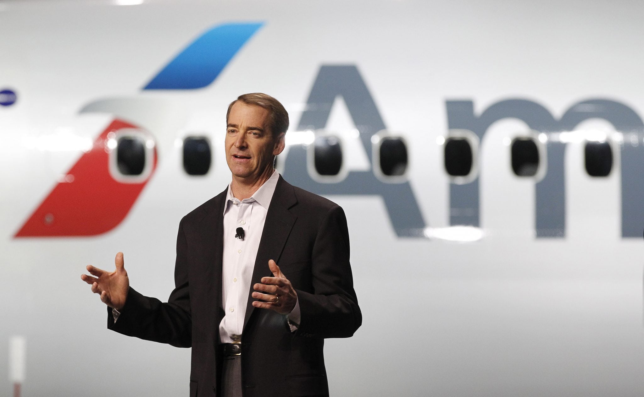 American Airlines CEO Tom Horton stands in front of a Boeing 738 to discuss the new look of their airplanes at Dallas/Fort Worth International Airport, Thursday, January 17, 2013. 