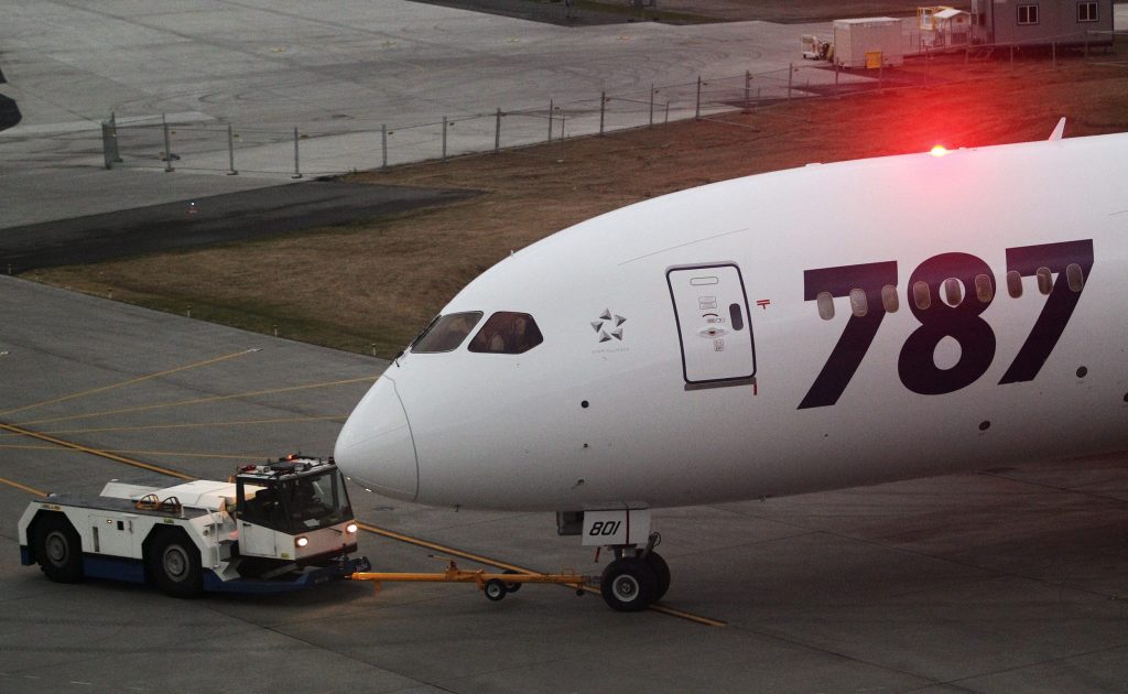 File photo of Boeing 787 Dreamliner airframe #8 being tugged out for takeoff from Paine Field in Everett.