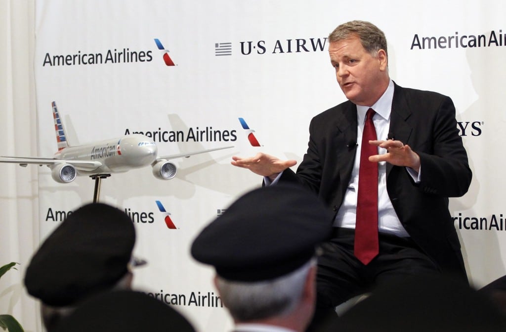 U.S. Airways CEO Doug Parker announcing the planned merger of AMR, with U.S. Airways, as members of the Allied Pilots Association and U.S. Airways Pilots Association listen. 