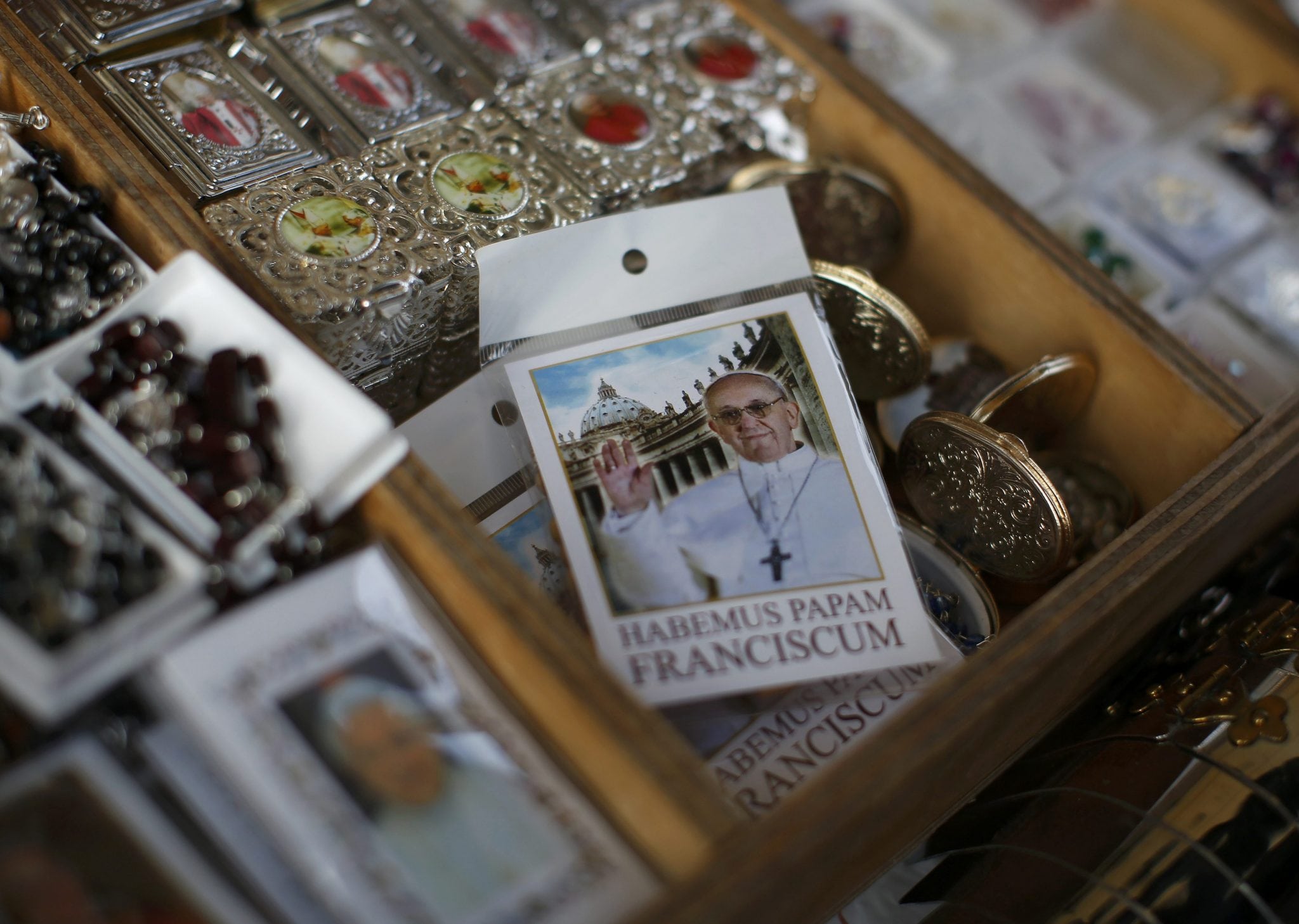 A rosary package with the newly-printed image of the newly-elected Pope Francis, Cardinal Jorge Mario Bergoglio of Argentina is displayed in a tourist shop outside the Vatican in Rome, March 14. 